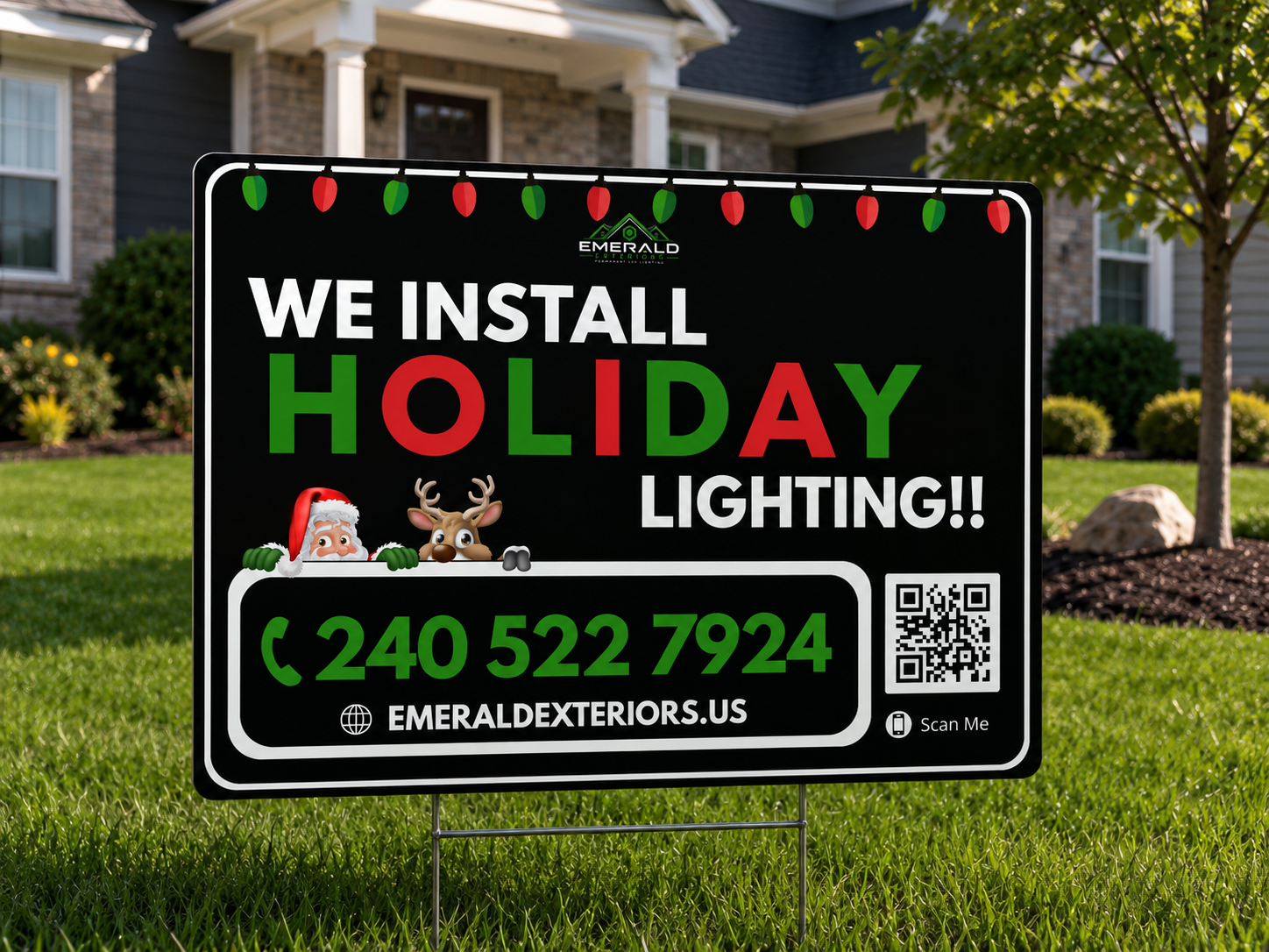 Emerald Exteriors holiday lighting yard sign in front of a customer's home